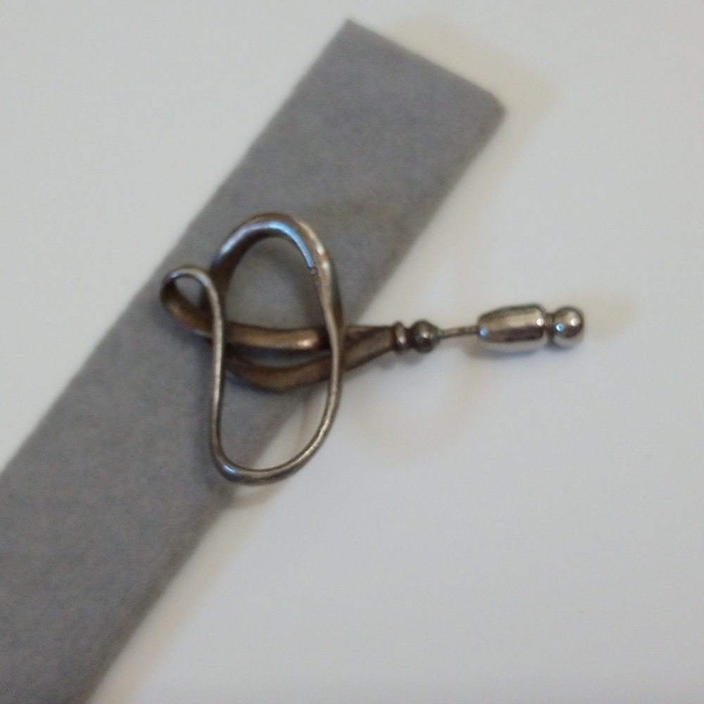 Vintage calla lily flower pin marked MoMA and sterling